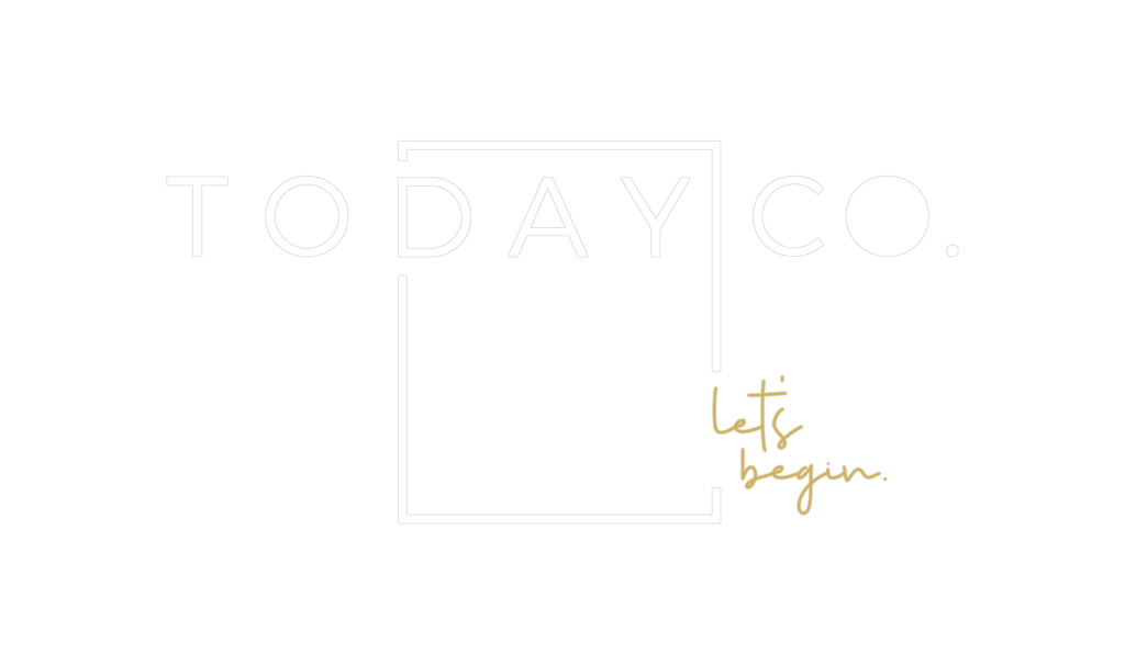 The Today Co. logo comprises a rectangle with solid black lines. The word 'TO' sits outside the rectangle to the top left and the word 'CO.' sits outside the rectangle to the top right. The word 'DAY' sits inside the top third of the rectangle, giving the impression of a calendar or planner. There is a gap in the second vertical line of the rectangle with the words 'let's begin' in gold cursive font. The 'o' in Co. is solid black followed by a full stop’. Followed by Let's Begin text.